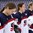 MALMO, SWEDEN - MARCH 31: USA's Alex Carpenter #25 bows her head during the US national anthem a 9-2 preliminary round win over Russia at the 2015 IIHF Ice Hockey Women's World Championship. (Photo by Andre Ringuette/HHOF-IIHF Images)

